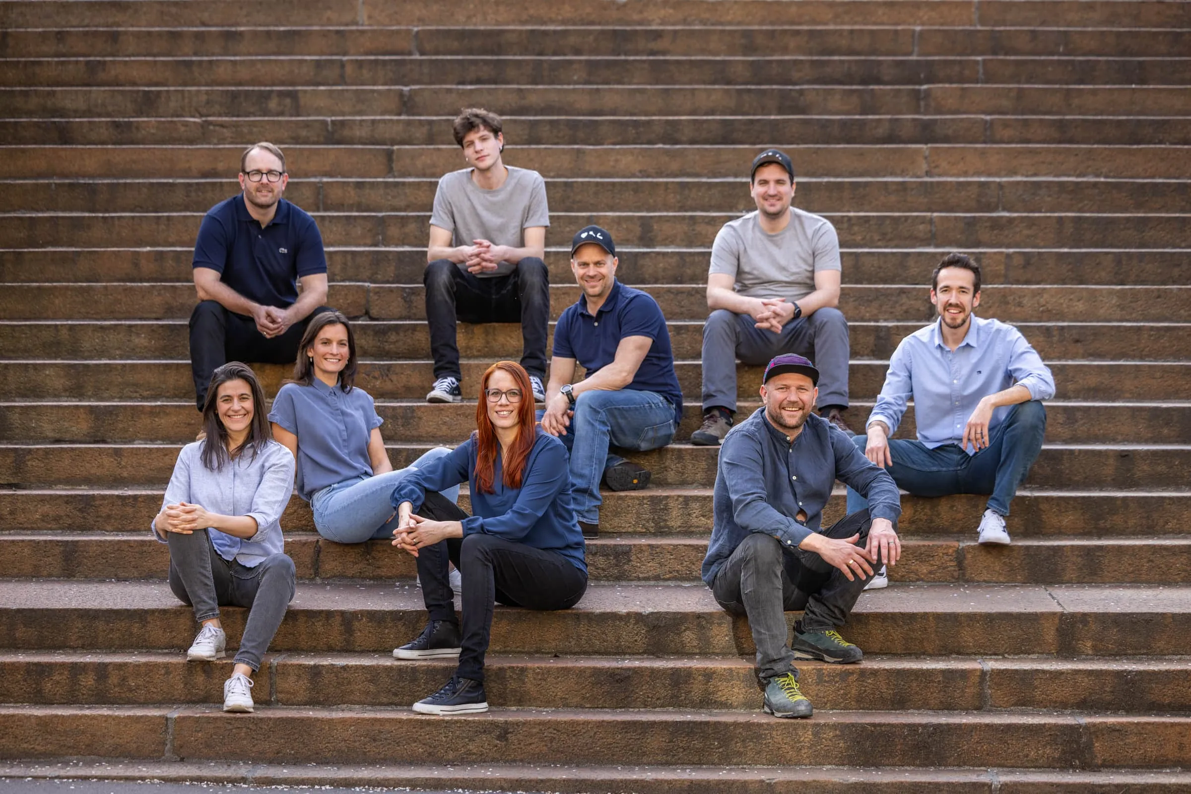 The made team on the steps outside the workshop