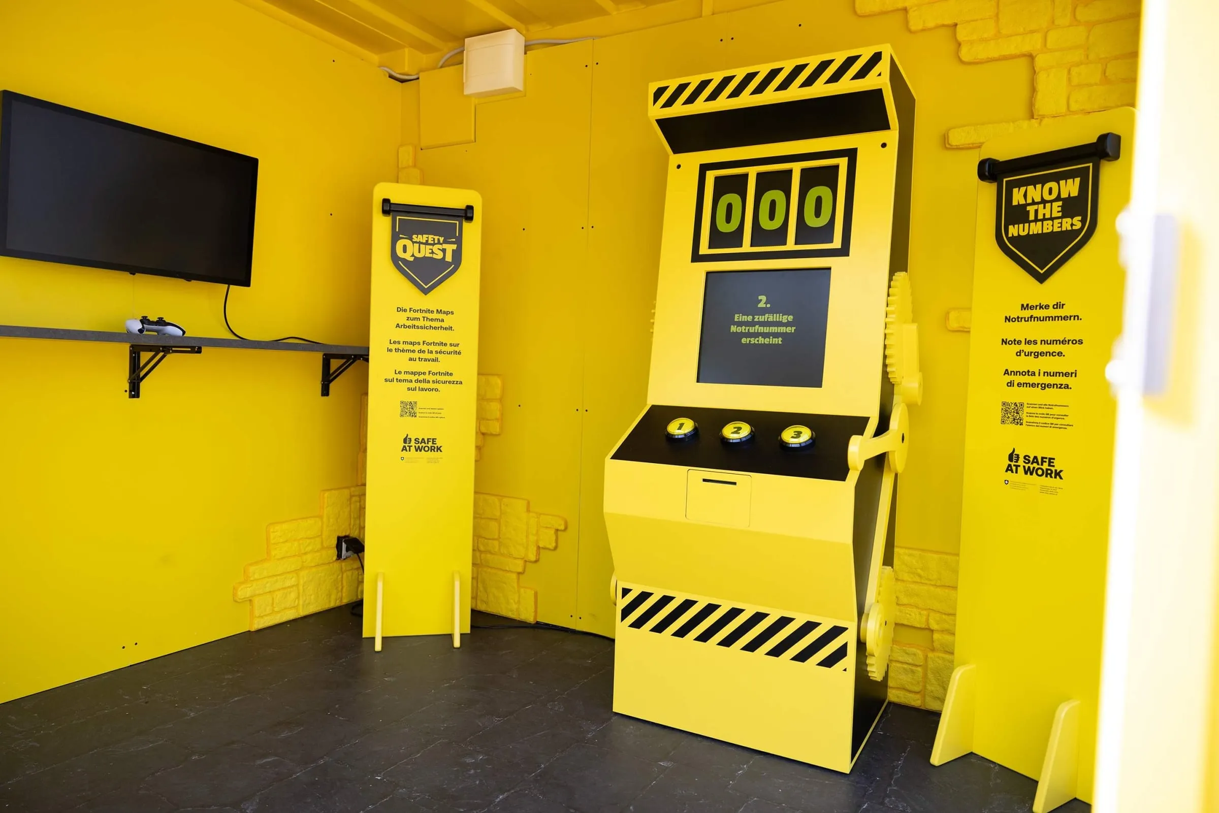 Yellow «Know the Numbers» slot machine with a «000» display, three buttons and a lever, a screen with a controller on the left